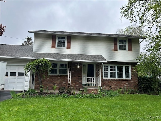 5131 Bear Rd, Clay, NY 13212 - traditional-style home featuring an attached garage, brick siding, and a front lawn