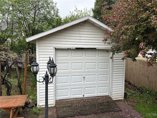 5131 Bear Rd, Clay, NY 13212 - detached garage featuring fence