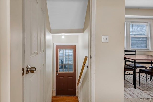 doorway to outside with wood finished floors