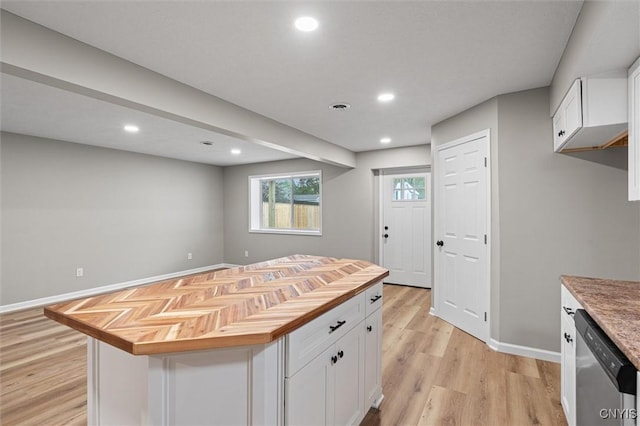 614 E Broadway St, Fulton, NY 13069 - kitchen featuring dishwasher, wood counters, white cabinetry, light wood-type flooring, and recessed lighting