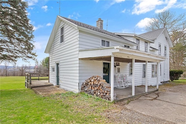 3542 Griffin Rd, Onondaga, NY 13215 - view of front of house with a chimney and a front yard