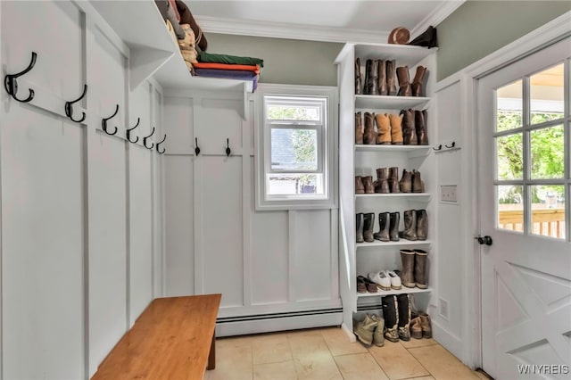mudroom with a baseboard radiator, crown molding, a decorative wall, and light tile patterned floors