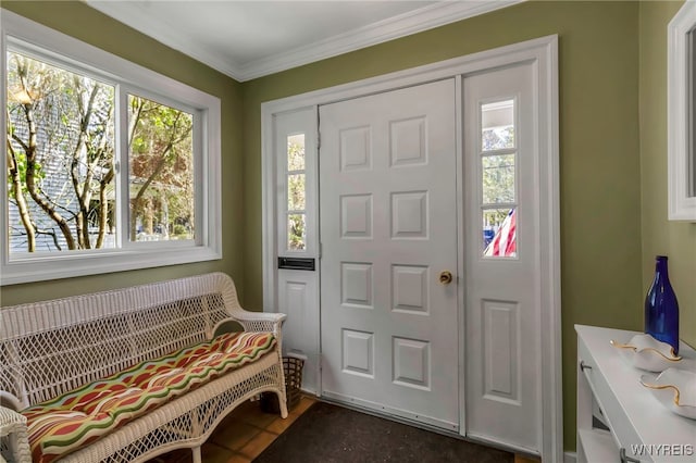 foyer entrance with healthy amount of natural light and ornamental molding
