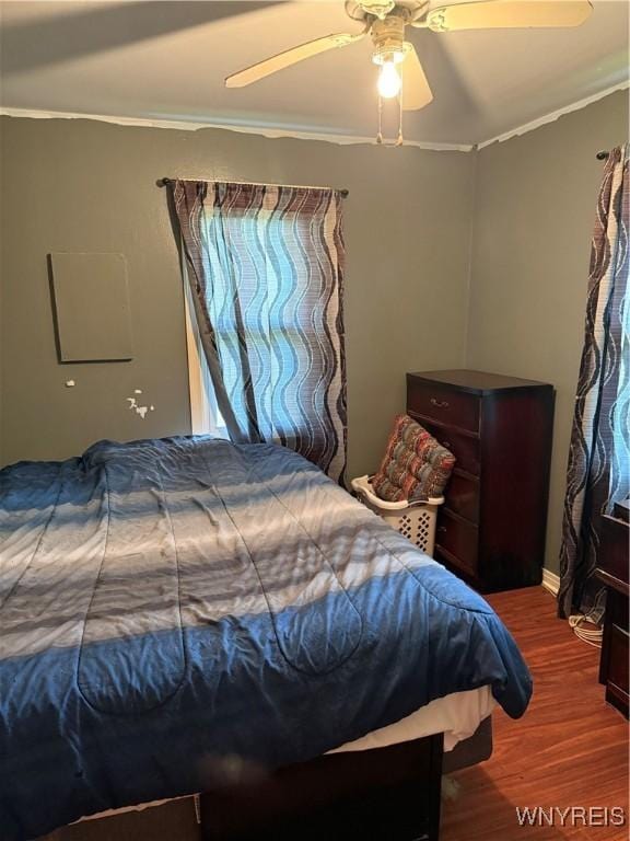 6358 Dale Rd, Newfane, NY 14108 - bedroom with ornamental molding, wood finished floors, and a ceiling fan