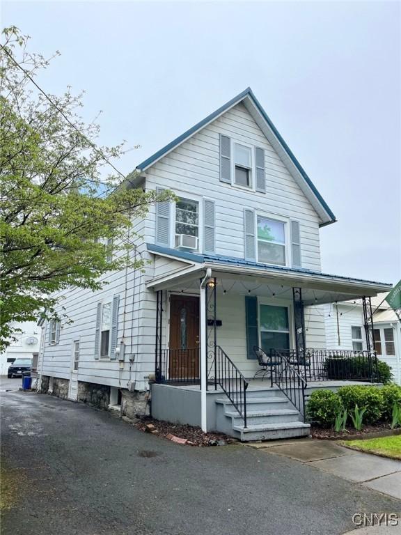 23 Paul St, Auburn, NY 13021 - view of front of property with a porch