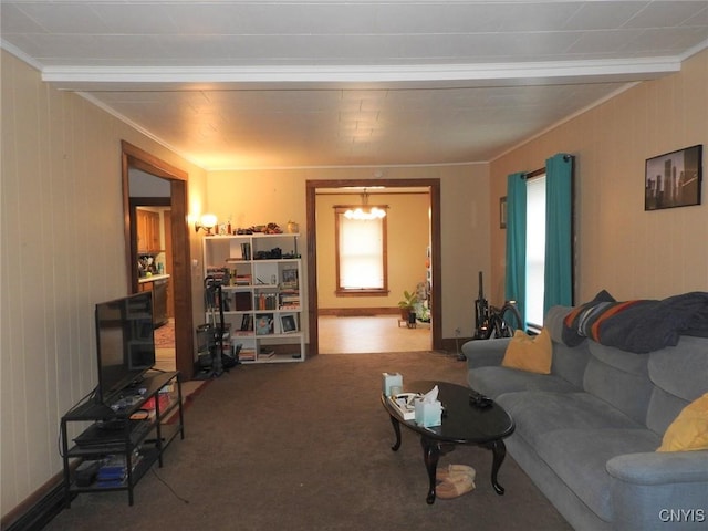 23 Paul St, Auburn, NY 13021 - living room with crown molding, carpet flooring, a chandelier, and wooden walls