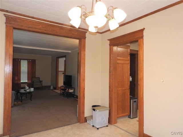 23 Paul St, Auburn, NY 13021 - corridor featuring a chandelier, light colored carpet, and ornamental molding