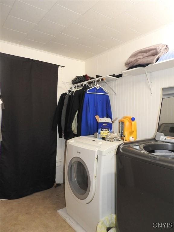 23 Paul St, Auburn, NY 13021 - washroom featuring separate washer and dryer and light carpet