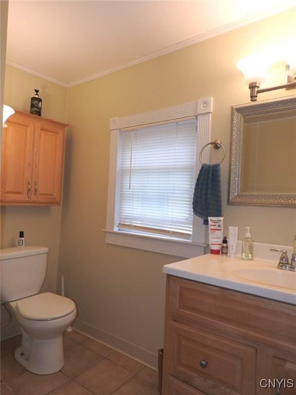 23 Paul St, Auburn, NY 13021 - half bath featuring toilet, tile patterned floors, ornamental molding, vanity, and baseboards