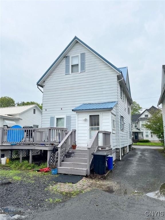 23 Paul St, Auburn, NY 13021 - rear view of property with a wooden deck