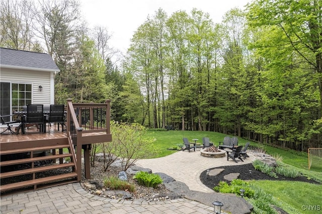 4314 Arbutus Dr, Pompey, NY 13104 - view of patio / terrace with an outdoor fire pit, a wooden deck, and outdoor dining space