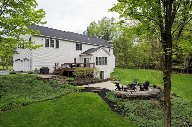 4314 Arbutus Dr, Pompey, NY 13104 - back of property featuring a deck, a garage, a fire pit, and a yard
