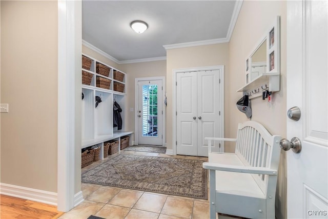 4314 Arbutus Dr, Pompey, NY 13104 - mudroom with crown molding, light tile patterned floors, and baseboards