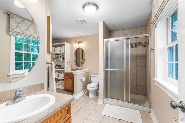 4314 Arbutus Dr, Pompey, NY 13104 - bathroom with a shower stall, vanity, tile patterned flooring, and toilet
