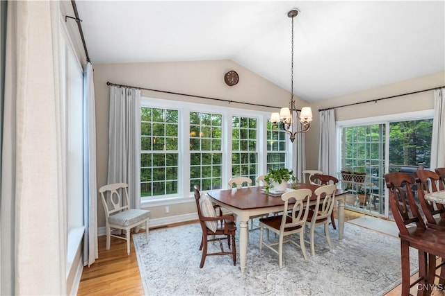 4314 Arbutus Dr, Pompey, NY 13104 - dining room featuring light wood-style floors, healthy amount of natural light, lofted ceiling, a chandelier, and baseboards