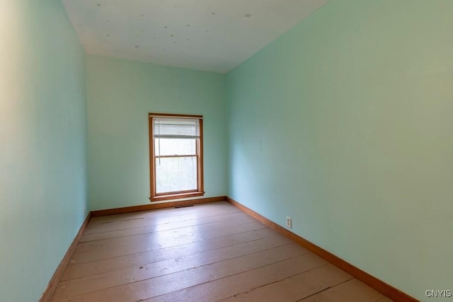 1957 Torpy Pond Rd, Georgetown, NY 13061 - unfurnished room with light wood-style floors and baseboards