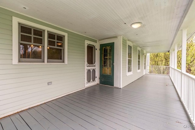 1957 Torpy Pond Rd, Georgetown, NY 13061 - wooden terrace featuring a porch