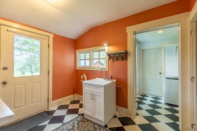 1957 Torpy Pond Rd, Georgetown, NY 13061 - washroom with tile patterned floors, a sink, and baseboards
