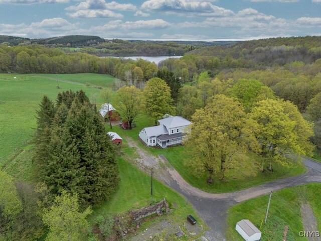 1957 Torpy Pond Rd, Georgetown, NY 13061 - aerial view of property's location featuring a large body of water and a heavily wooded area