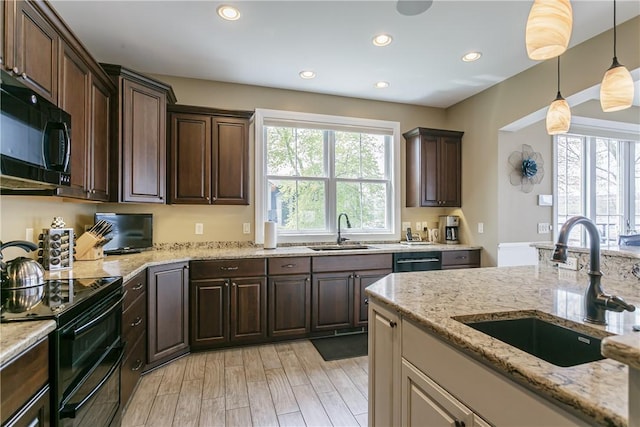 5088 E Lake Rd, Gorham, NY 14544 - kitchen featuring black appliances, a sink, dark brown cabinets, and recessed lighting