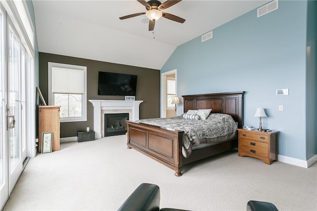 5088 E Lake Rd, Gorham, NY 14544 - carpeted bedroom featuring vaulted ceiling, baseboards, a glass covered fireplace, and ceiling fan