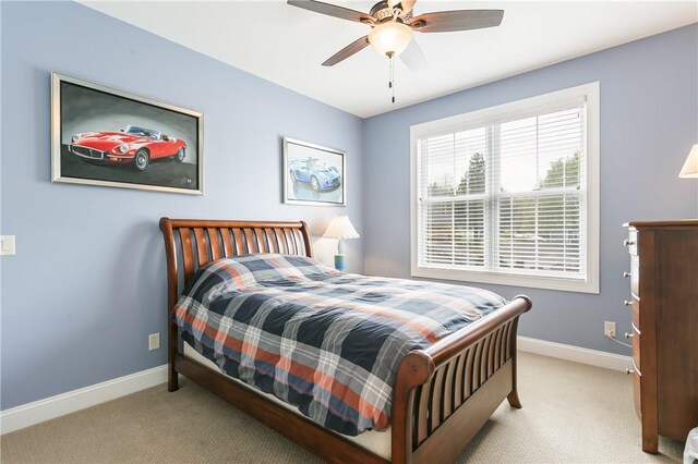 5088 E Lake Rd, Gorham, NY 14544 - carpeted bedroom featuring baseboards and a ceiling fan