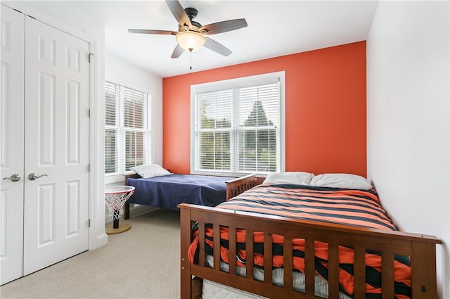 5088 E Lake Rd, Gorham, NY 14544 - carpeted bedroom with multiple windows, ceiling fan, and a closet