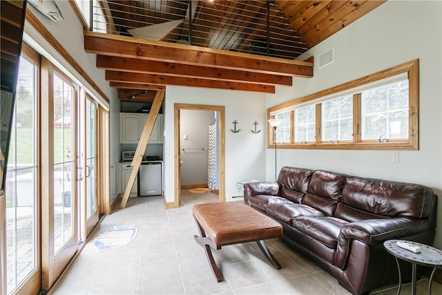 5088 E Lake Rd, Gorham, NY 14544 - living room with healthy amount of natural light, light tile patterned flooring, and baseboards