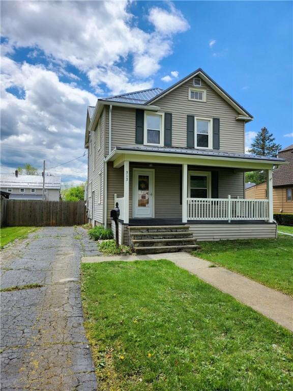 515 Park Pl, Erwin, NY 14870 - view of front facade featuring covered porch, driveway, and metal roof