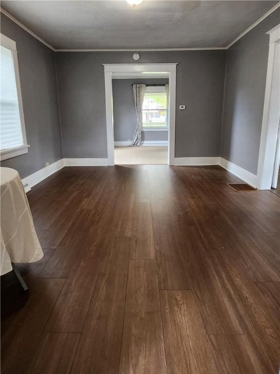 515 Park Pl, Erwin, NY 14870 - unfurnished room with dark wood-type flooring, crown molding, and baseboards