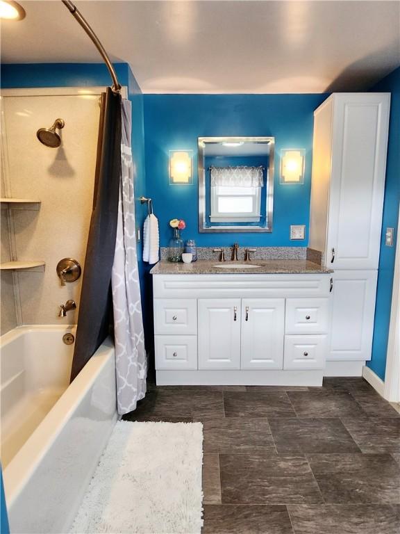 515 Park Pl, Erwin, NY 14870 - bathroom featuring shower / bathtub combination with curtain and vanity