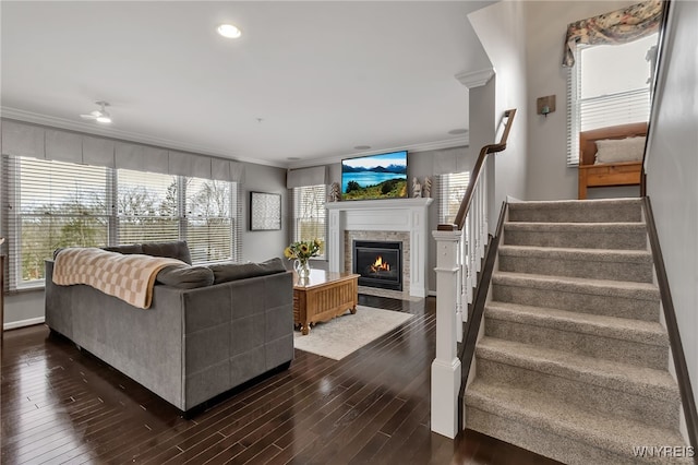 905 Sullivan Ct, Lewiston, NY 14092 - living room featuring ornamental molding, a fireplace with flush hearth, dark wood-type flooring, stairway, and recessed lighting