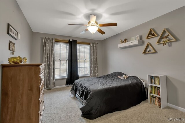 905 Sullivan Ct, Lewiston, NY 14092 - bedroom with carpet floors, baseboards, and a ceiling fan