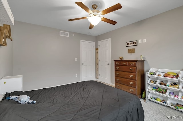 bedroom with carpet floors and a ceiling fan