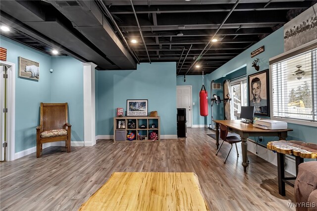 905 Sullivan Ct, Lewiston, NY 14092 - rec room featuring wood finished floors, baseboards, and an office area