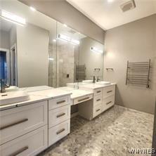 bathroom with double vanity