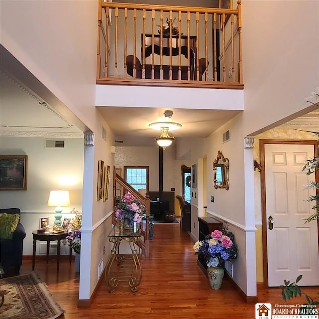 384 Flickerwood Rd, Kane-Borough, PA 16735 - entryway featuring wood finished floors, a towering ceiling, and baseboards