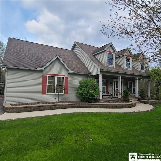 384 Flickerwood Rd, Kane-Borough, PA 16735 - cape cod-style house with a porch, a front lawn, and a shingled roof