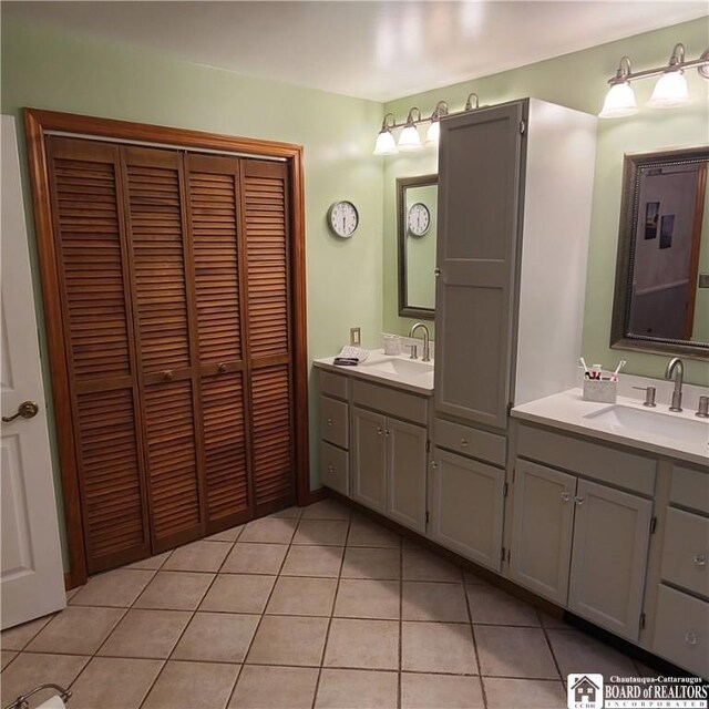 384 Flickerwood Rd, Kane-Borough, PA 16735 - full bathroom featuring tile patterned floors, vanity, and a closet