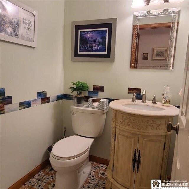 384 Flickerwood Rd, Kane-Borough, PA 16735 - bathroom featuring toilet, vanity, baseboards, and tile patterned flooring