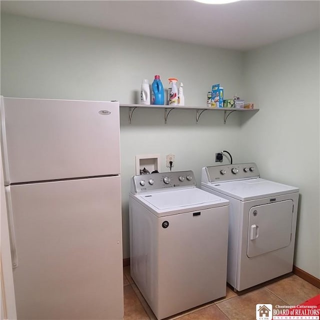 384 Flickerwood Rd, Kane-Borough, PA 16735 - clothes washing area with separate washer and dryer and light tile patterned floors