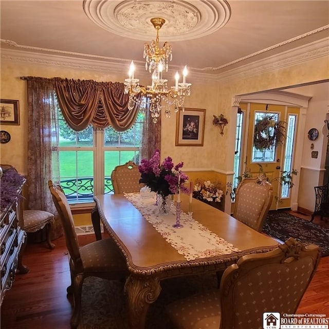 384 Flickerwood Rd, Kane-Borough, PA 16735 - dining room featuring a chandelier, wood finished floors, plenty of natural light, and crown molding