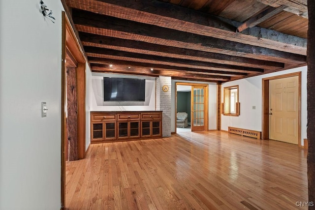 1826 Cardner Rd, Fabius, NY 13122 - unfurnished living room featuring wood finished floors and beamed ceiling