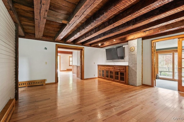 1826 Cardner Rd, Fabius, NY 13122 - unfurnished living room with light wood-type flooring, wood ceiling, beamed ceiling, and baseboards