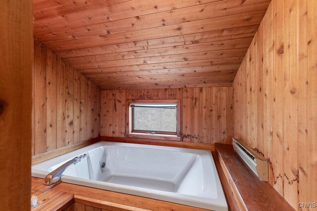 1826 Cardner Rd, Fabius, NY 13122 - bathroom with wooden ceiling, wooden walls, and a garden tub