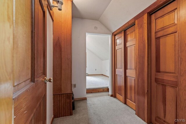 1826 Cardner Rd, Fabius, NY 13122 - hall featuring lofted ceiling, light colored carpet, and baseboards