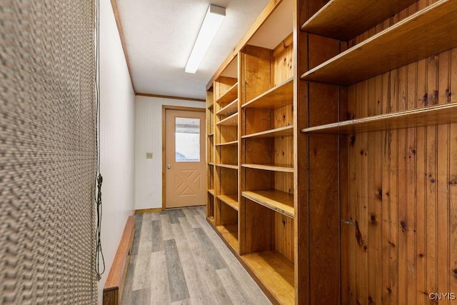 1826 Cardner Rd, Fabius, NY 13122 - mudroom with light wood-type flooring and ornamental molding