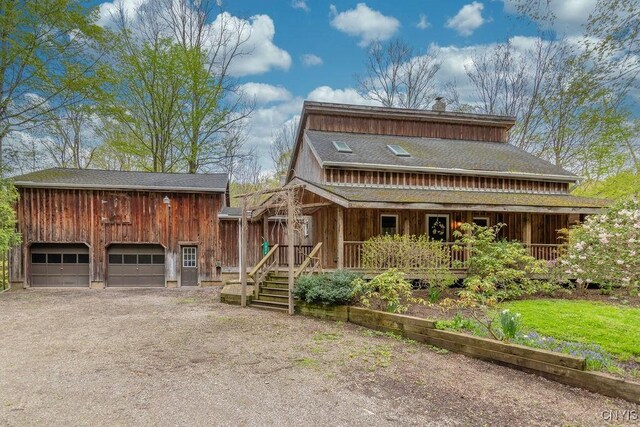 1826 Cardner Rd, Fabius, NY 13122 - view of front of house with a porch and a garage