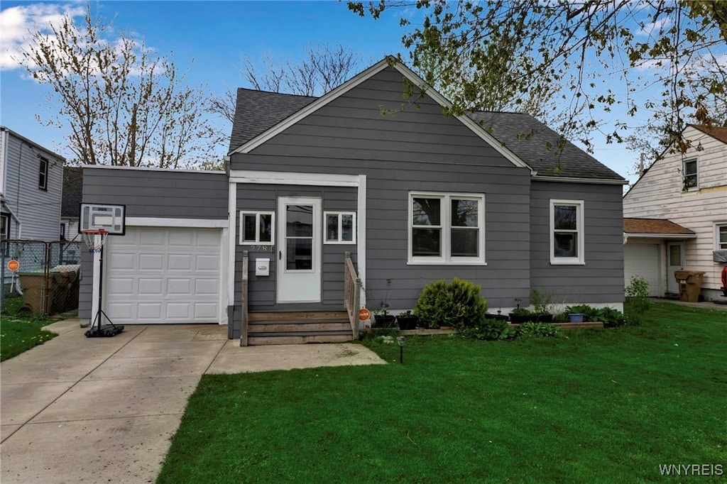 278 Cleveland Dr, Cheektowaga, NY 14215 - back of house with an attached garage, driveway, a lawn, and roof with shingles