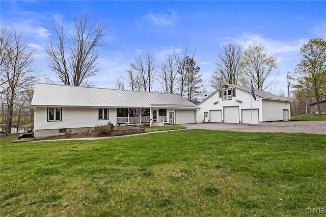 545 County Route 54, Schroeppel, NY 13132 - view of front facade with covered porch, a front yard, metal roof, a detached garage, and driveway